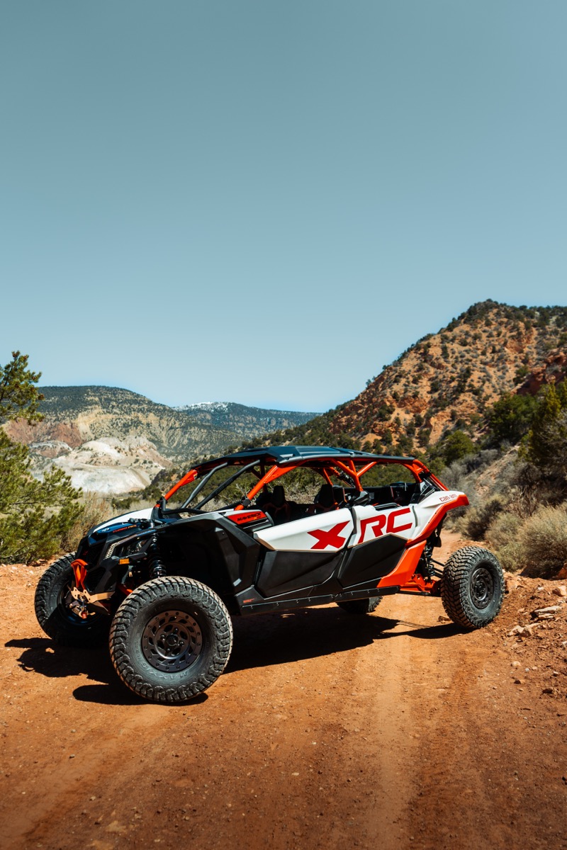 Can-Am UTV on red rock trail in Southern Utah demanding regular maintenance
