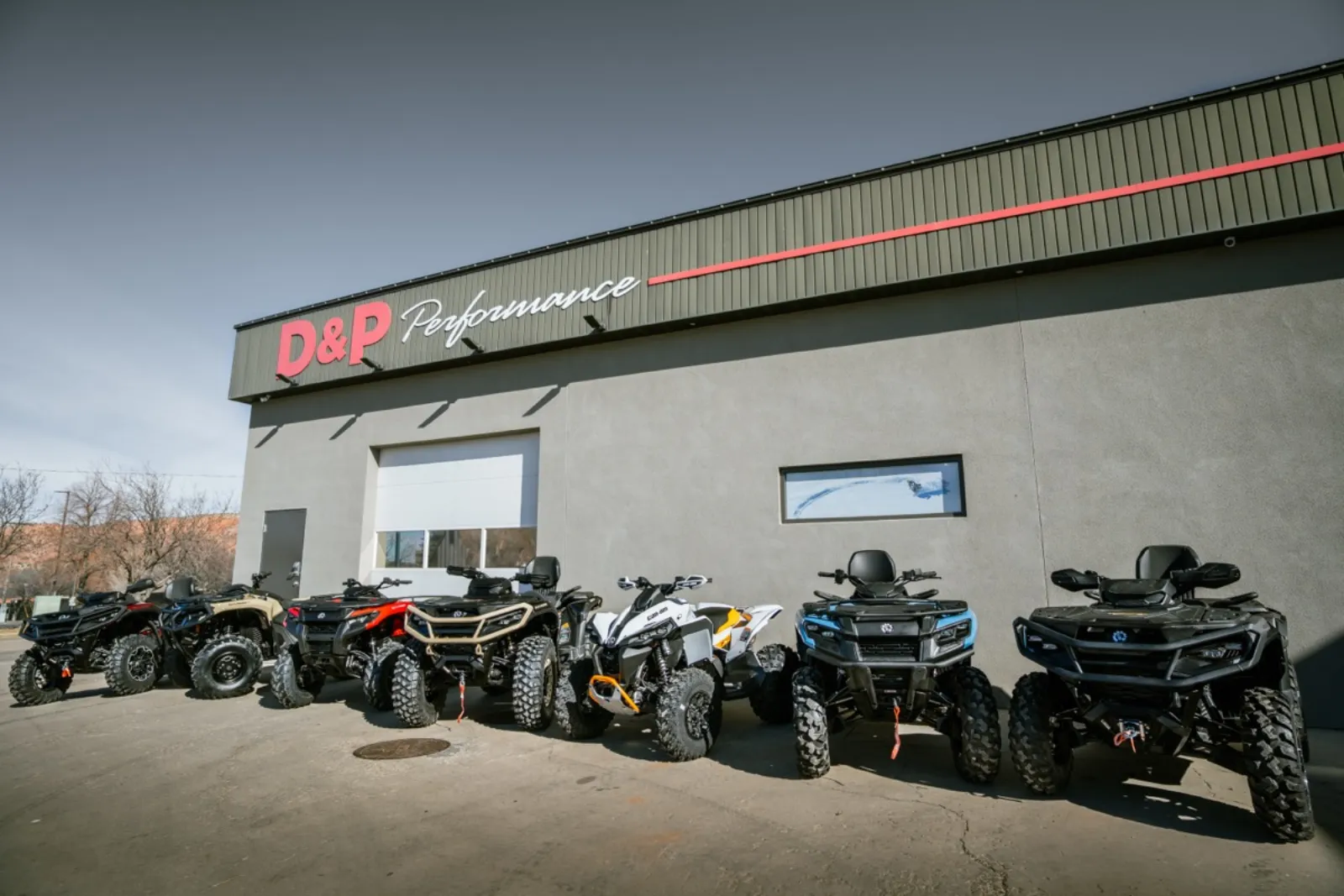 D&P Performance storefront with lineup of Can-Am ATVs in Cedar City Utah