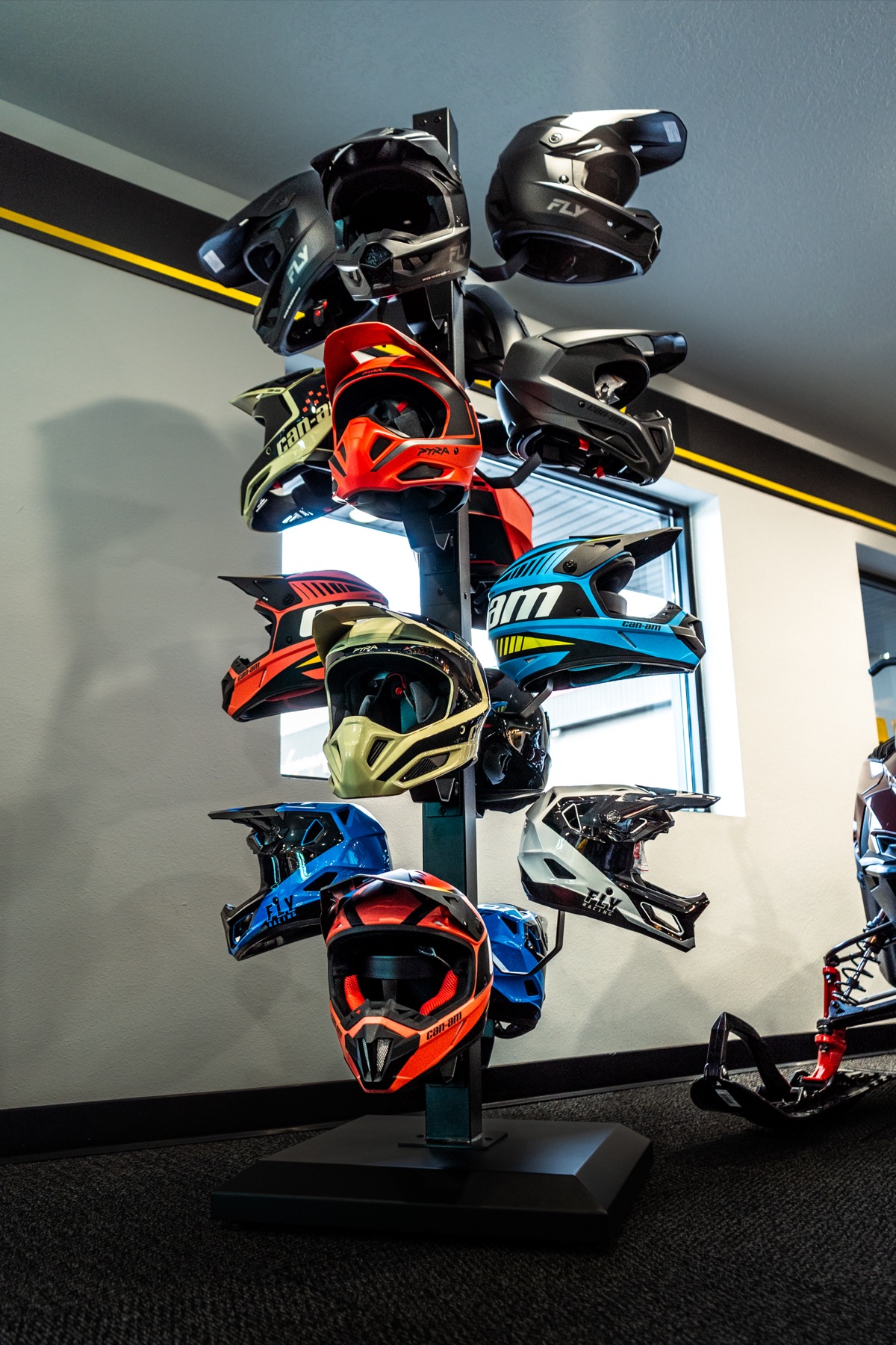 Powersports helmet display at D&P Performance in Cedar City showing Fly Racing and other brands for UTV riders
